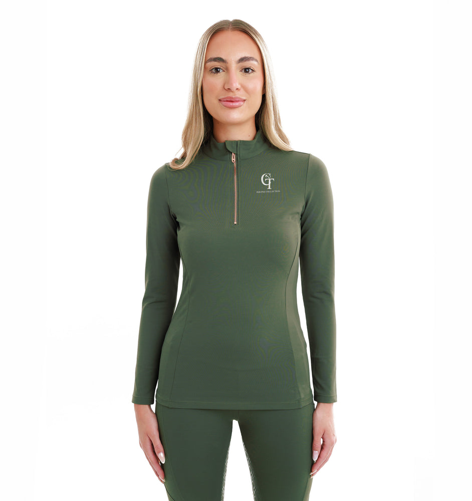 
                  
                    Woman wearing an olive green long-sleeve top with quarter zip and logo on a plain white background
                  
                