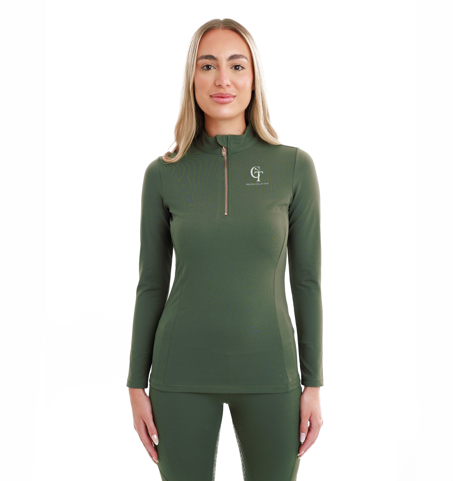 
                  
                    Woman wearing an olive green long-sleeve top with quarter zip and logo on a plain white background
                  
                